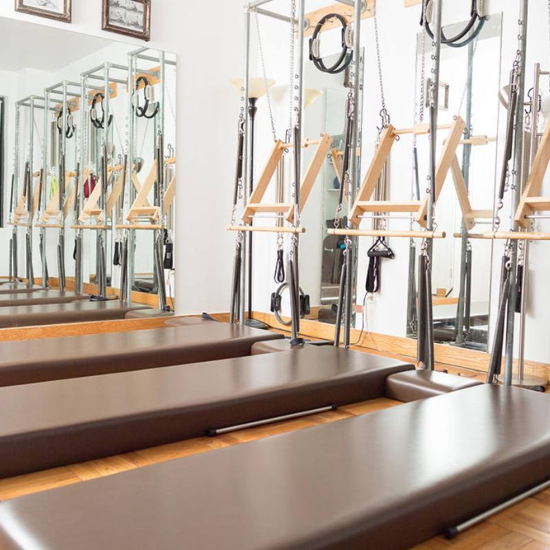 Pilates towers and raised mats by Gratz in the classical Pilates studio on the Upper East Side in Manhattan NYC
